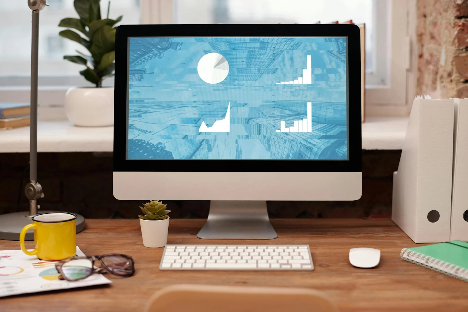 Computer screen displaying website analytics and performance charts