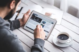 Man holding an ipad