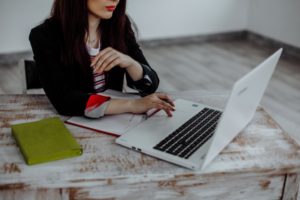 Woman looking at her laptop